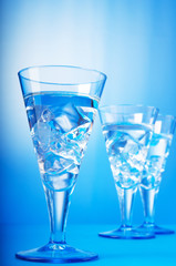 Water in the glass against gradient background