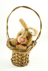 Easter rabbit in a wattled basket