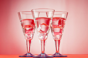 Water in the glass against gradient background