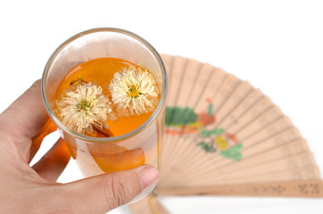 chinese tea and hand fan