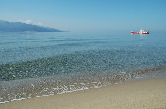 Ship sailing between Keramoti and Thassos island. Greece