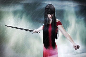 Fashion portrait of young pretty woman fighter