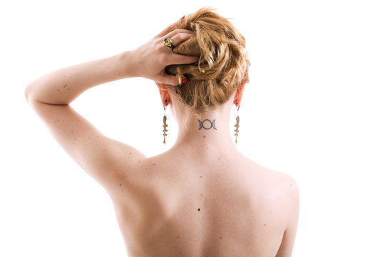 Woman With Slavonic Moon Rune Tattoo On Neck