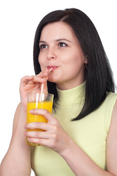 Woman with a glass of oranges juice