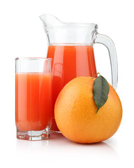 Full glass and jug of grapefruit juice and fruit isolated