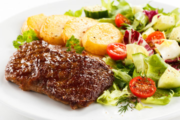 Grilled steak and vegetables