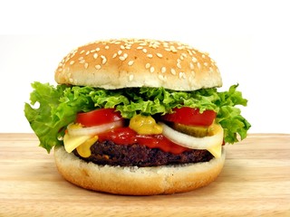 Cheeseburger close up on wooden board