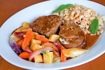 Meatloaf, oven roasted vegetables and macaroni