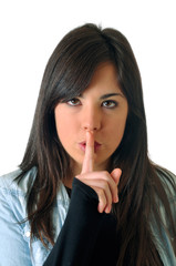 Young woman asking for silence