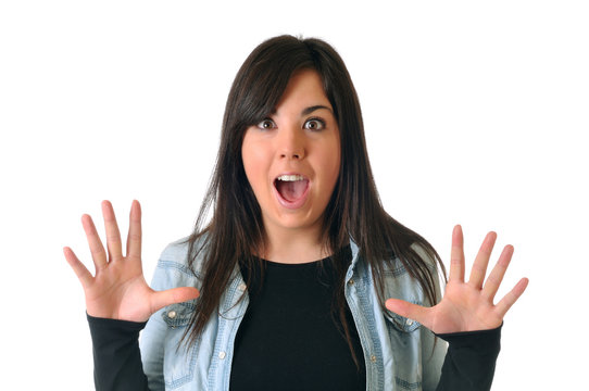 Young brown woman is surprised on white background