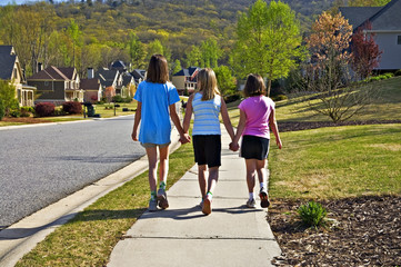 Three Young Girls Walking