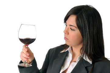 young brown woman observing a glass of red wine - 31373070