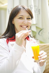woman drink juice outdoor