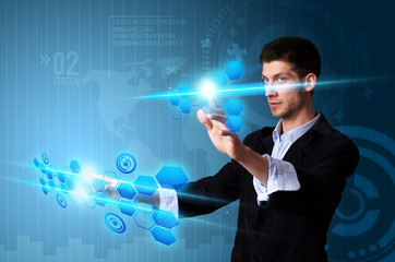 Man pressing modern touch screen buttons with a blue technology