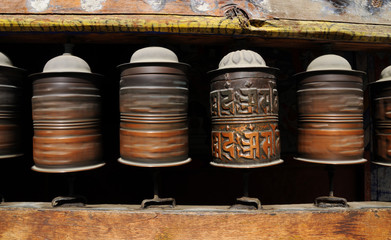 Spinning prayer wheels, Nepal