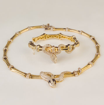 gold necklace and bracelet