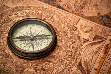 Antique Compass on Map