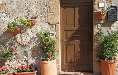 sunny flowery entrance in Italy