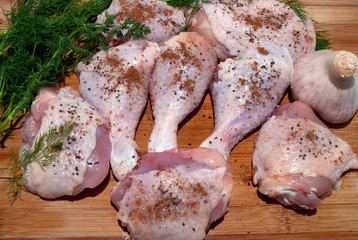 Raw chicken legs .