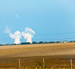 Fototapeta na wymiar France. Steam over Nuclear power station ..