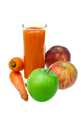 Apples, carrots and juice in a glass..