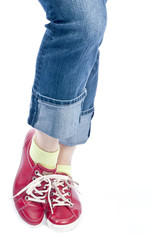 Woman Wearing Blue Jeans and Red Leather Shoes