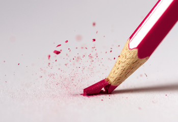 Red tip of a pencil shattering