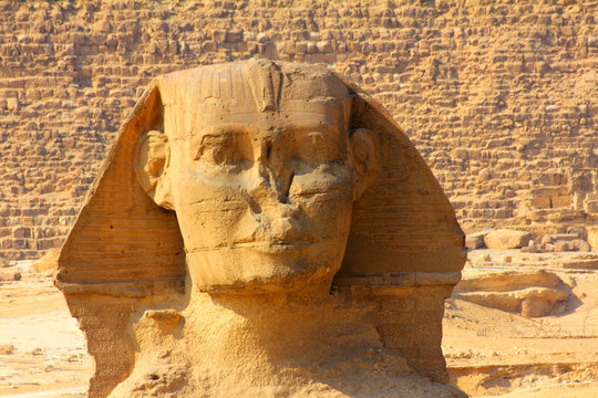 egypt sphinx face and pyramid in Giza
