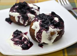 Cream cake with blueberry jam