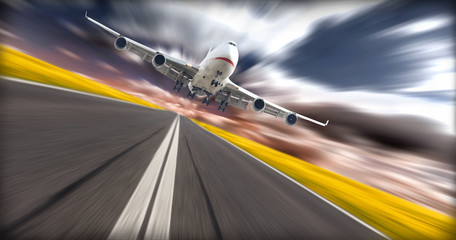 Jet plane above runway with blur background