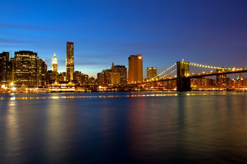 Sunset view of Brooklyn Bridge and Manhattan, New York