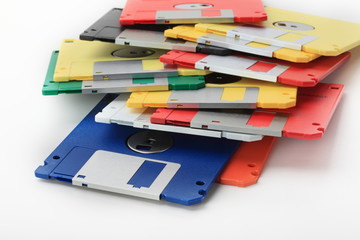 Many colored compute diskette isolated on white