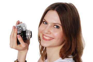 Fototapeta premium Pretty woman taking photo with vintage camera