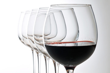 red wine glass and empty glasses