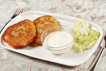 potato pancakes with the sour cream