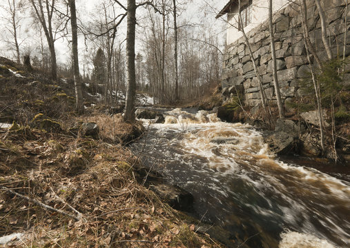 Spring flood running past old smeltery