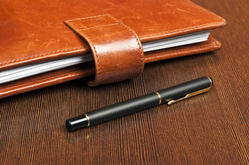 Notebbok and pen