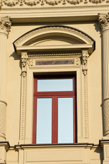 Obraz premium New window in old ornamented house