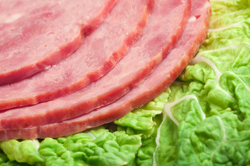 Beautiful sliced food arrangement of meat.