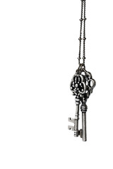 Ancient keys on a chain isolated on a white background
