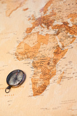 World map with compass showing Africa