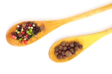 Foto op Plexiglas Specerijen peper in the wooden spoons on white