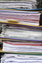Paper binder with lot of paperworks