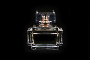 Perfume bottle isolated on black