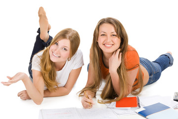 two young happy student girl, isolated on white