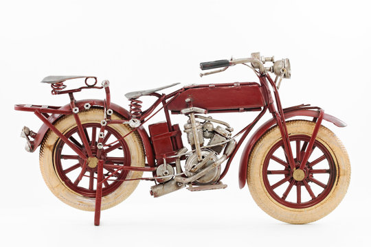Handmade tin 1930's vintage motorcycle model, isolated
