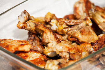 Chicken pieces prepared on a barbecue