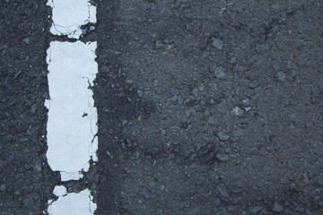 a street with white stripe