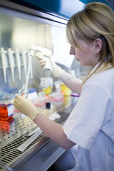 portrait of a female researcher doing research in a lab