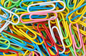 Many colorful paper clips